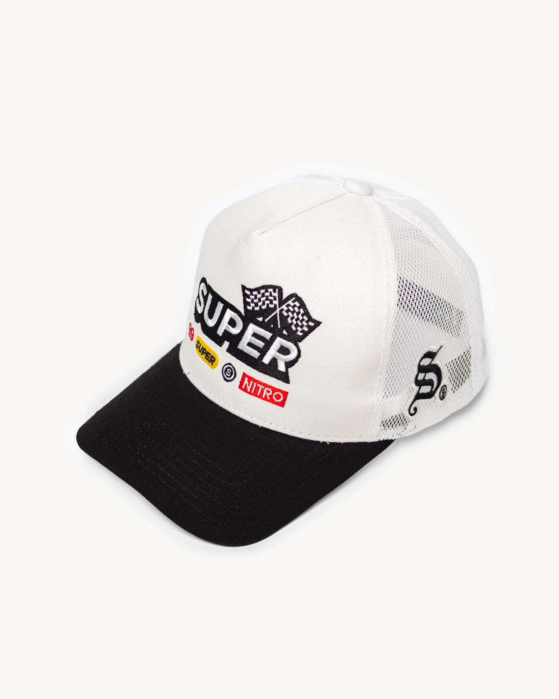 Front view of a cute two-toned white and black snapback hat featuring designer racing-inspired patches on the front and a cooling mesh rear design.