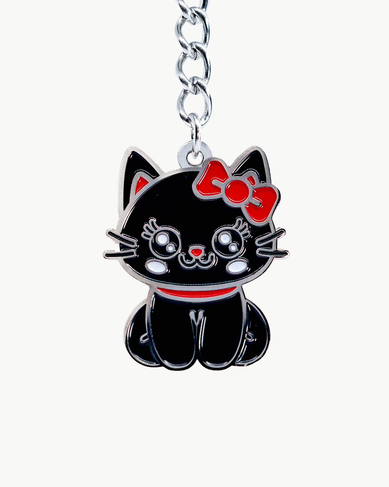 Black cute cat charm with a red bow, showcasing cool-cat energy and playful design.