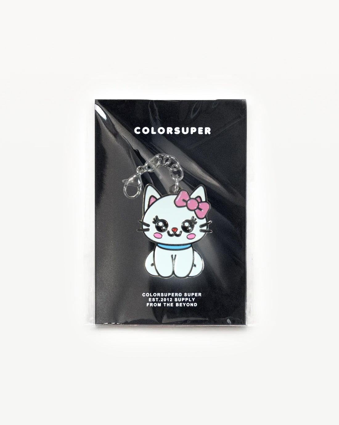 White cute cat charm with pink bow, pastel vibes, perfect for cozy accessories and charm collections.
