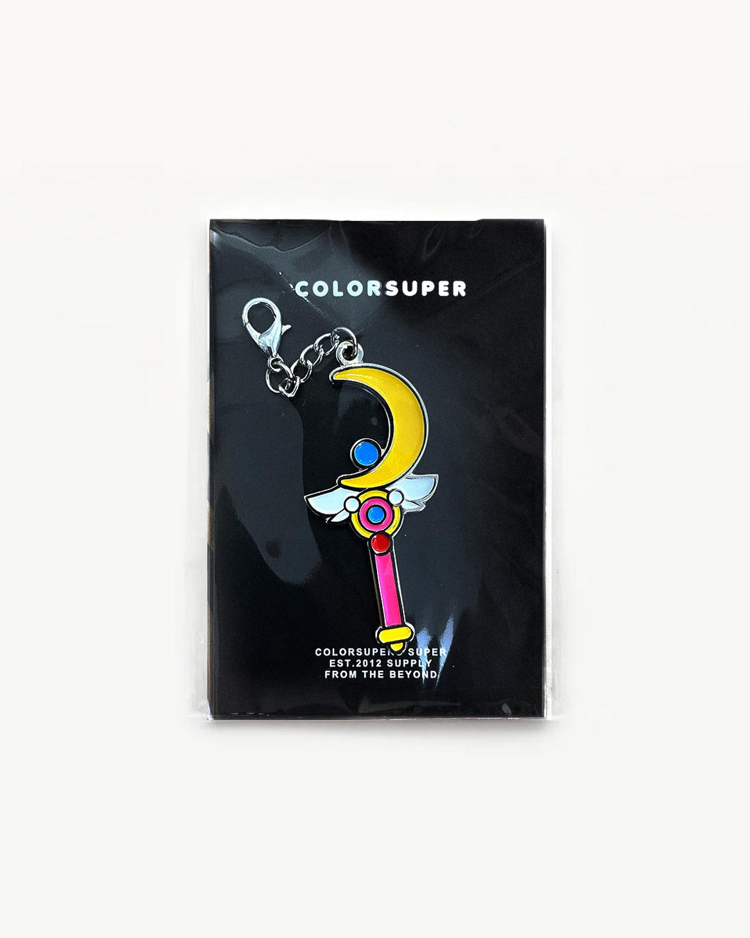Chrome moon stick bikini charm with lobster clasp.