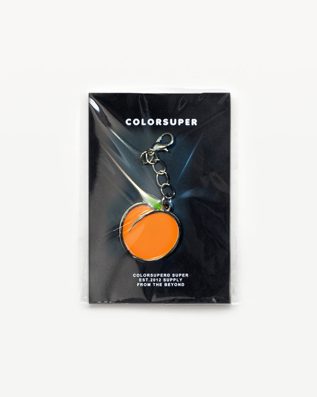 Chrome peach bikini charm with lobster clasp.