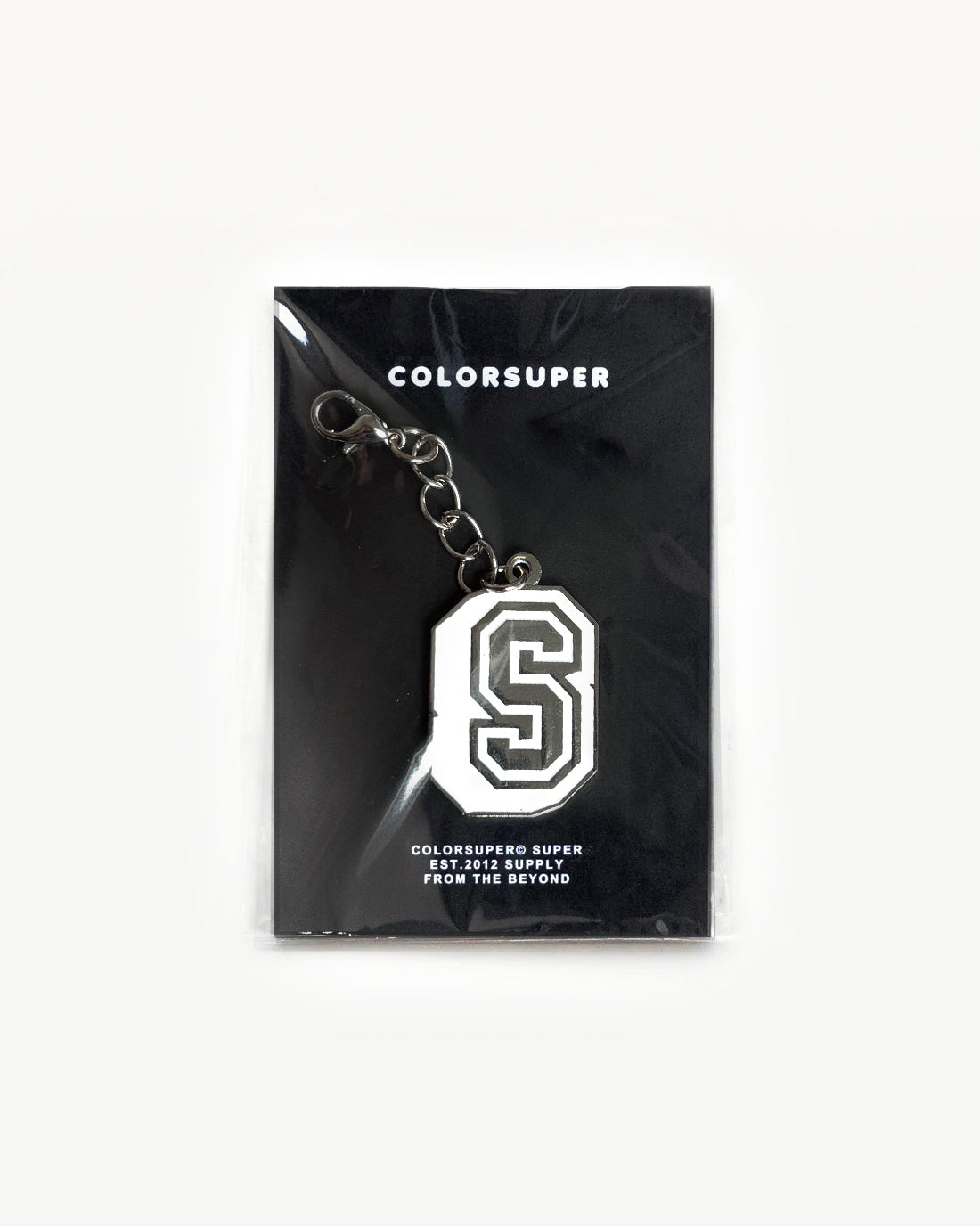 Chrome letter S white bikini charm with lobster clasp.