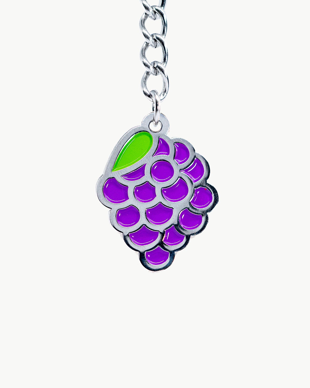Purple berry charm on a silver chain, perfect for adding a fruity flair to swim accessories and poolside outfits.