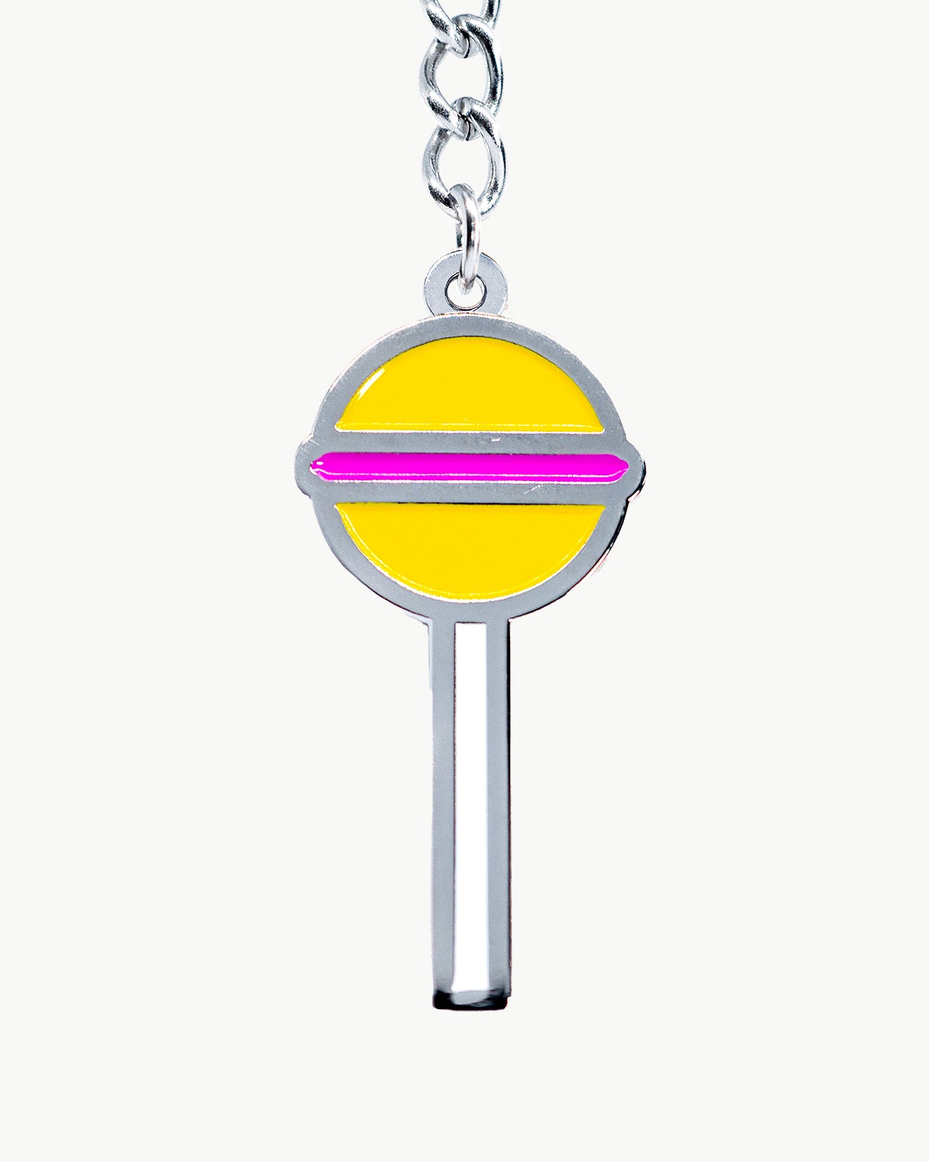 Bikini charm featuring a bright yellow lollipop design, perfect for youthful summer poolside style.
