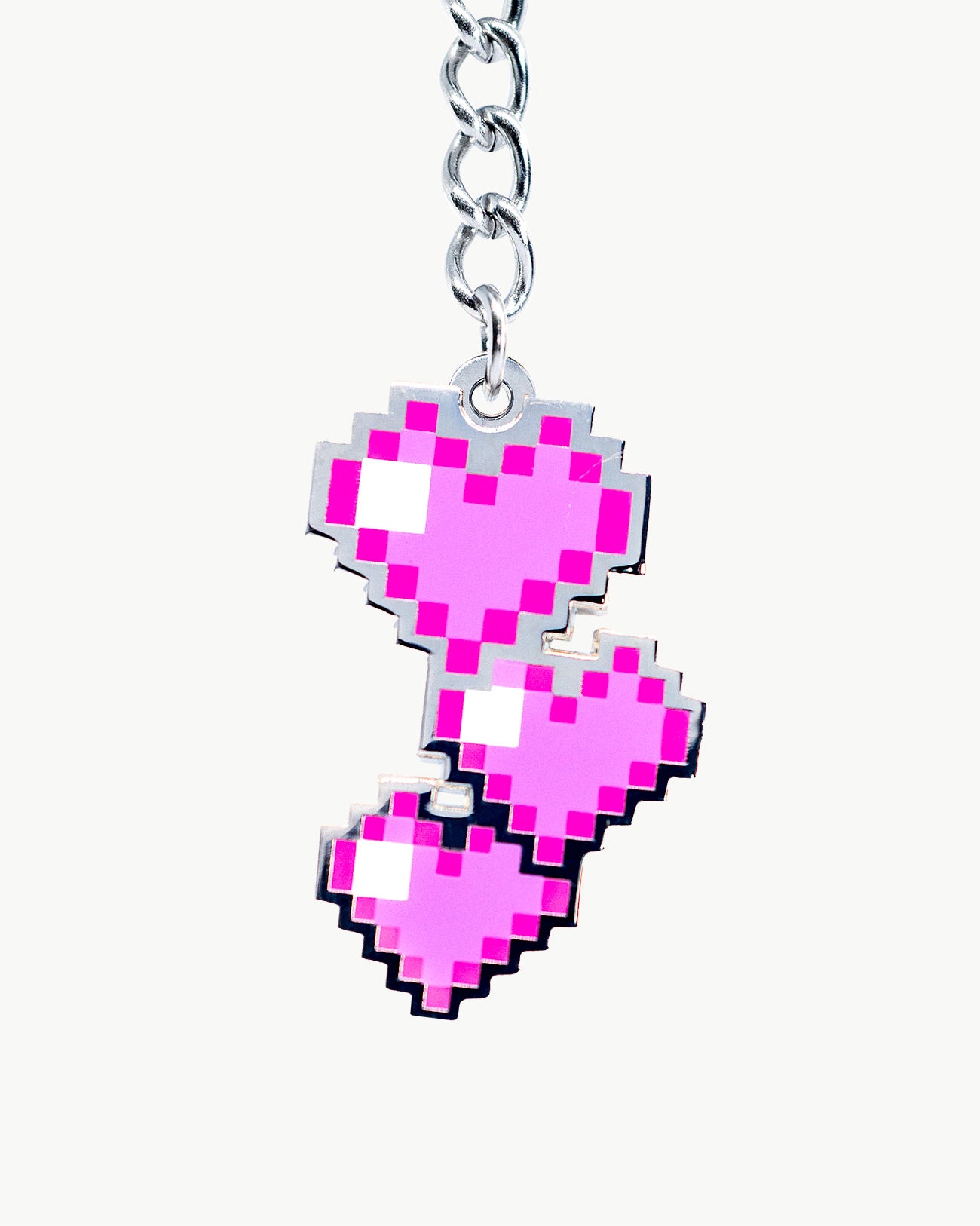 Pink heart bikini charm featuring pixel art design, perfect for romantic summer swimwear accessories.