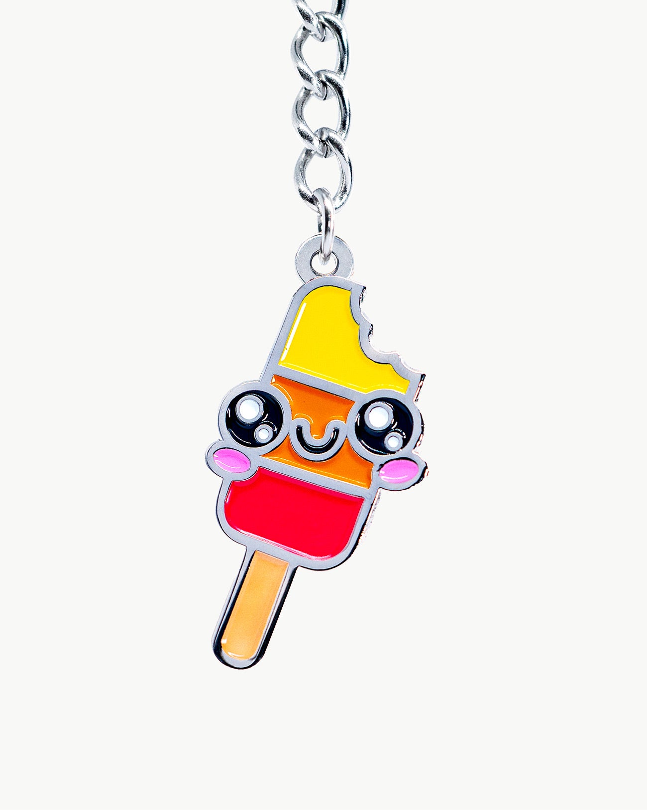 Colorful Triple Lolly charm with happy face, featuring rainbow colors and a bite taken out, perfect for summer fun.