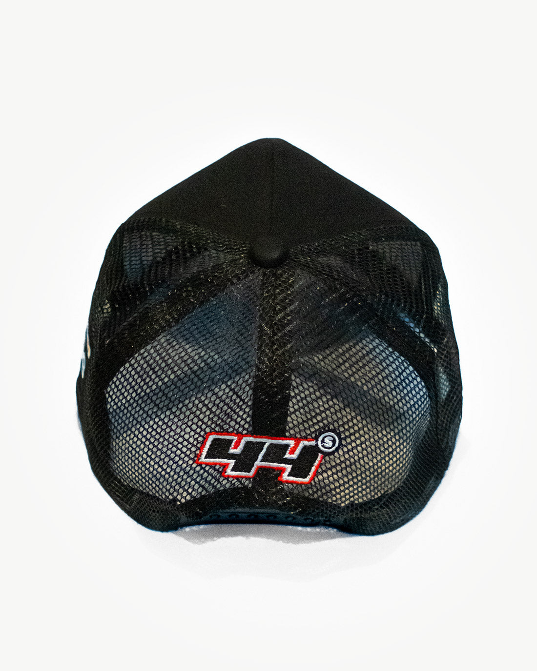 Back side of a super black mesh snapback hat with cute patches.