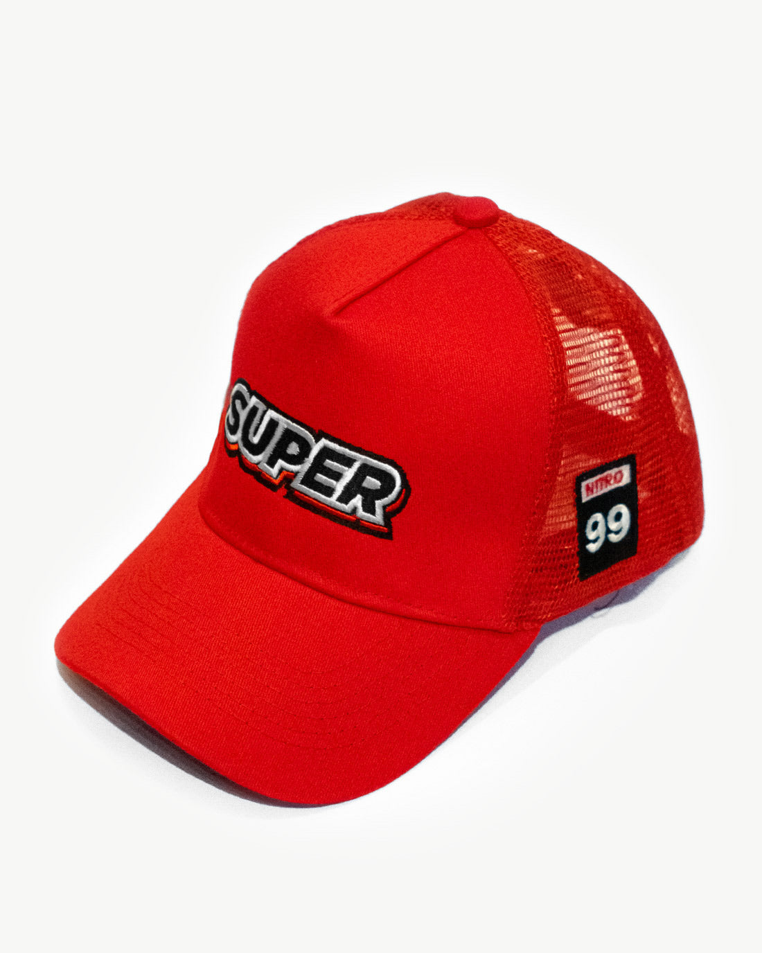 Front side of a super red mesh snapback hat with cool patches.