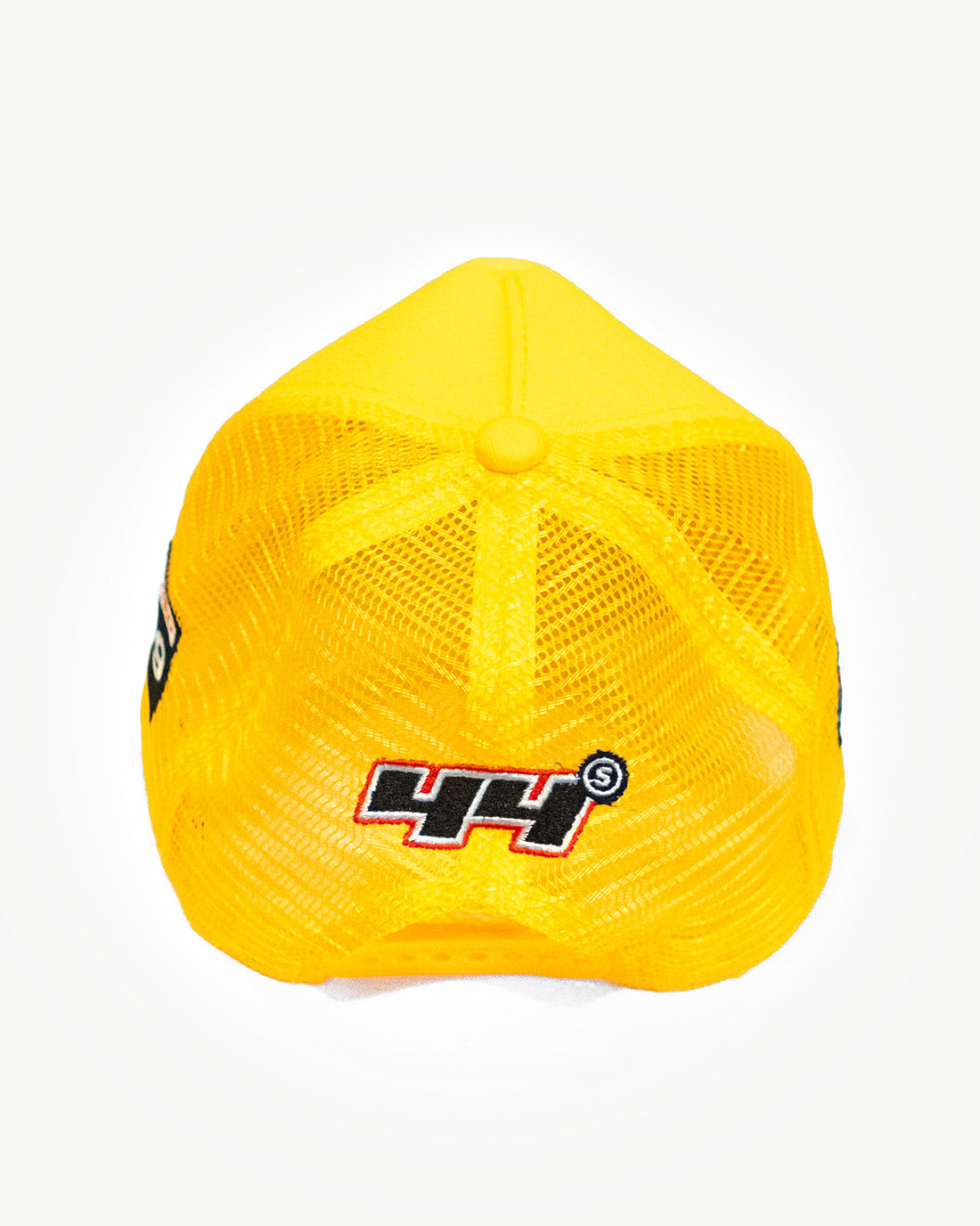 Back side of a super yellow mesh snapback hat with cool patches.