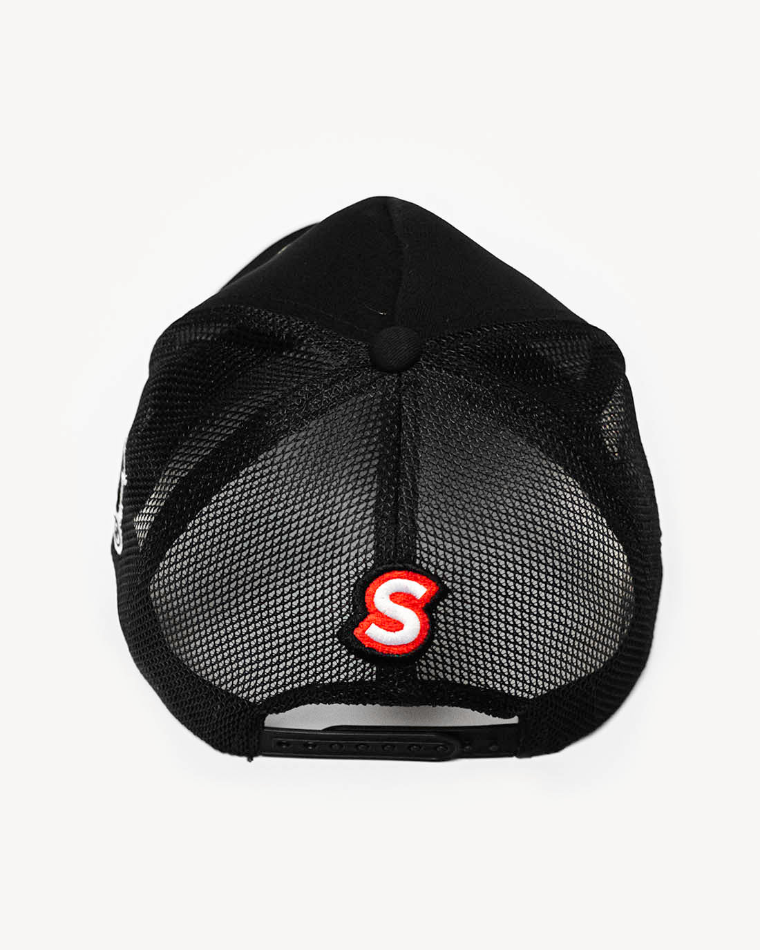 Rear side view of a black snapback hat with trendy racing-inspired embroidered design and cooling mesh back.