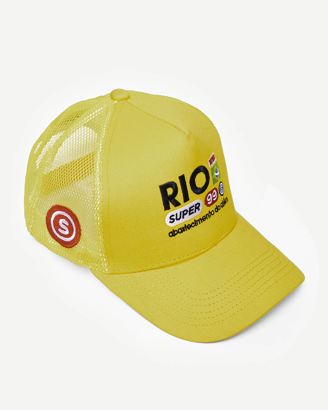 Front side view of a vibrant yellow snapback hat with Brazilian-inspired embroidered design and cooling mesh back.
