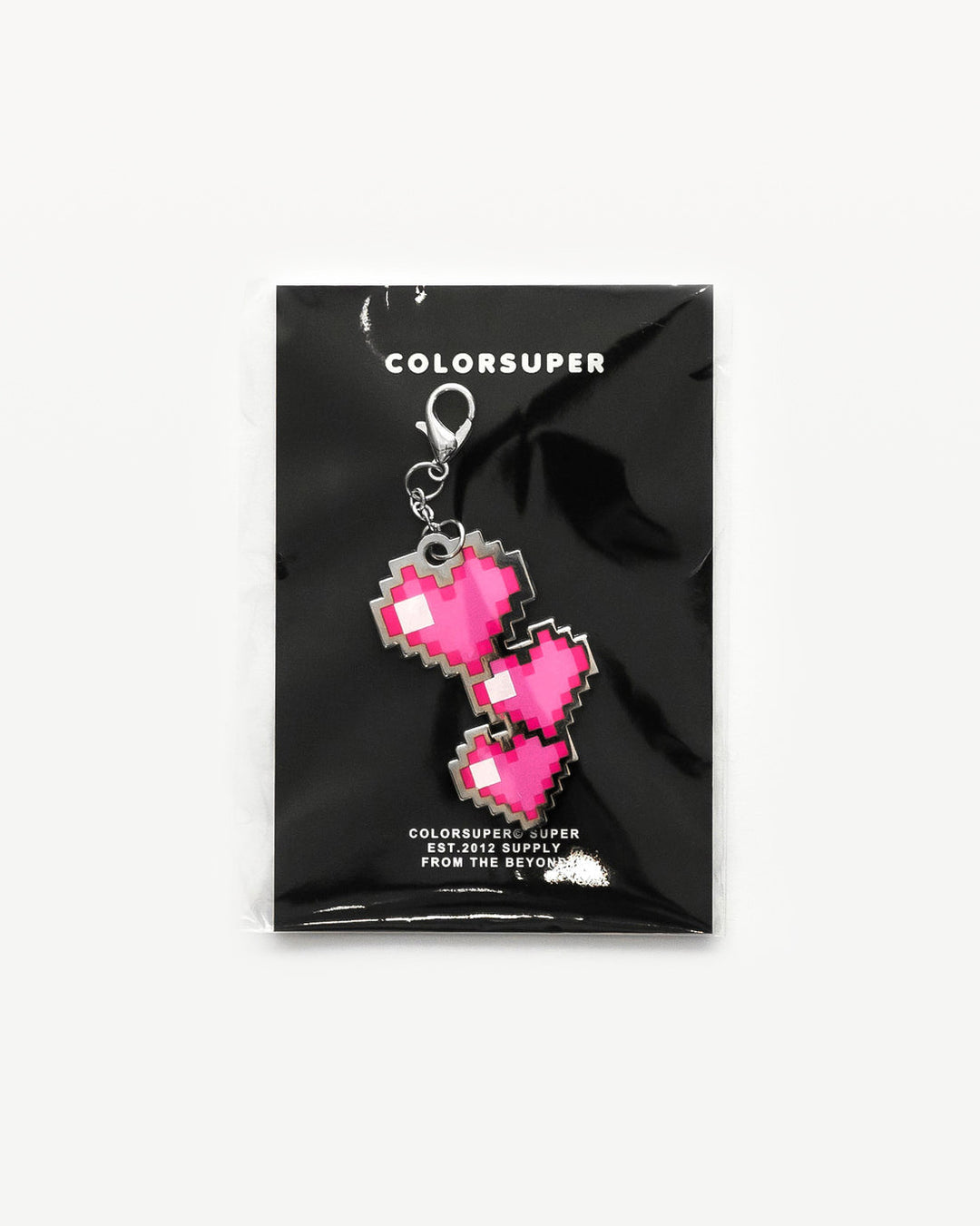 Chrome pink hearts bikini charm with lobster clasp.